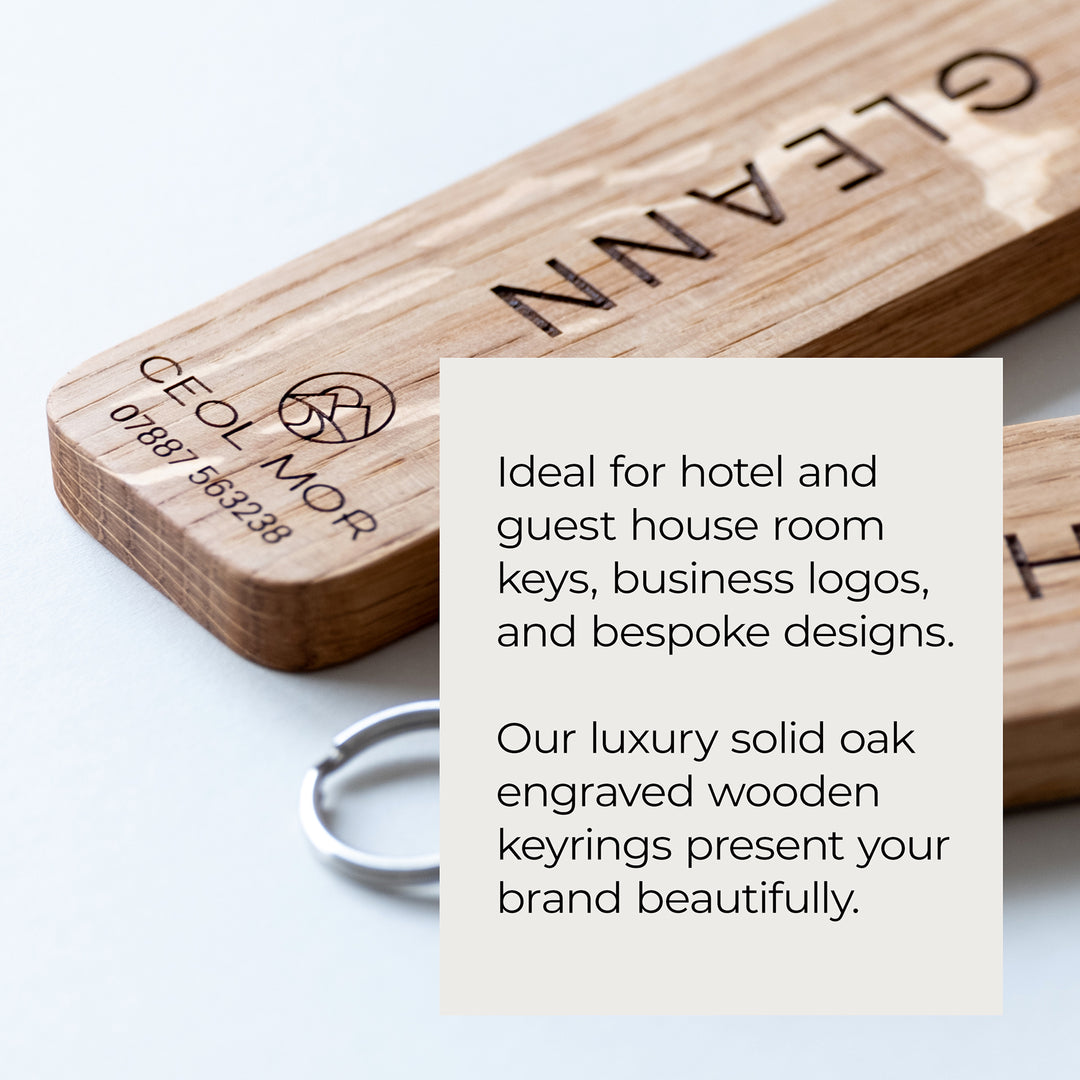 Wooden engraved keyring with text on a light background