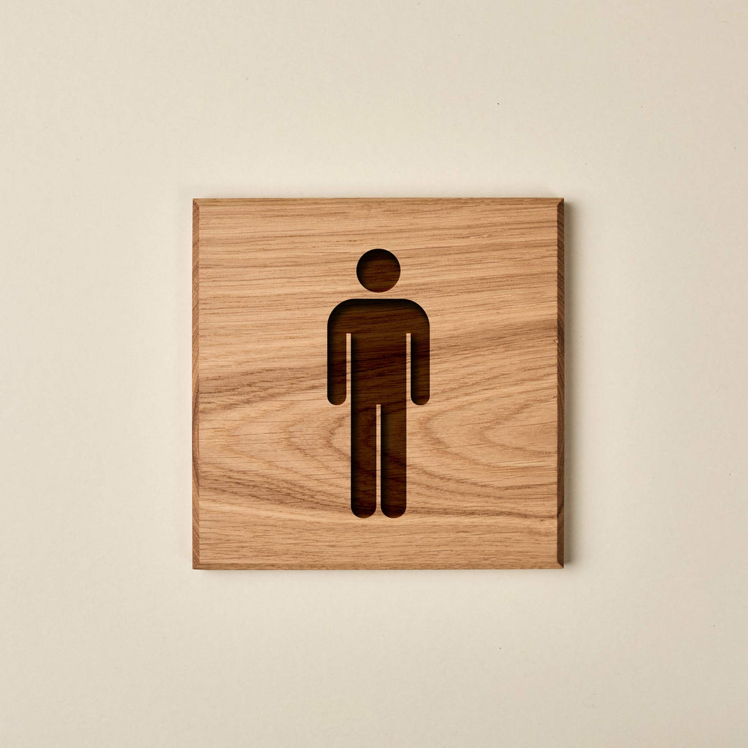 Square oak men's restroom sign featuring an engraved male silhouette. The sign has a warm, natural wood finish and a prominent grain.