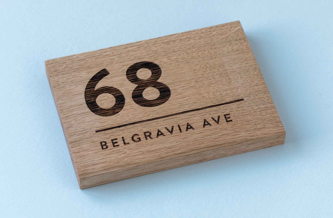 Oak House Address Number sign, close up, flat view at angle to show depth of sign. 