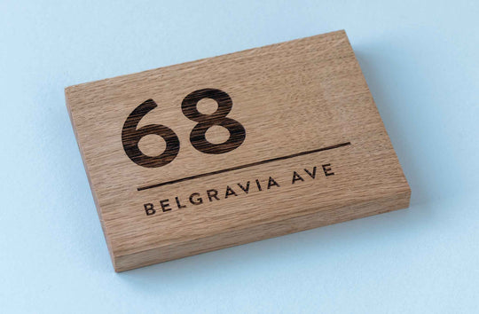 Oak House Address Number sign, close up, flat view at angle to show depth of sign. 